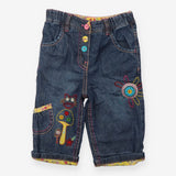 patchwork jeans with flowers and owl appliques