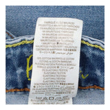 Jeans light blue floral pockets