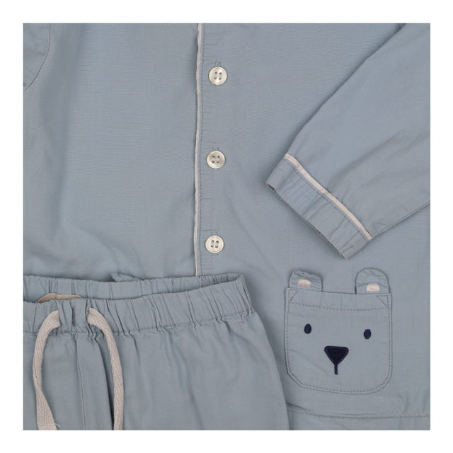 Blue button up pyjamas bear pockets