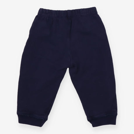 Navy joggers with white drawstring