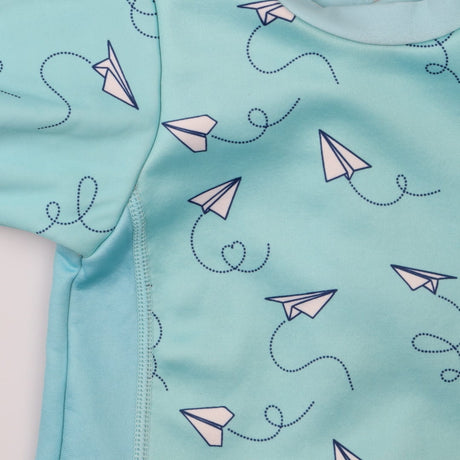 Baby blue paper aeroplane wetsuit