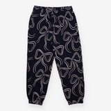 Navy joggers with white bows