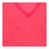 Pink v-neck pleated skater dress