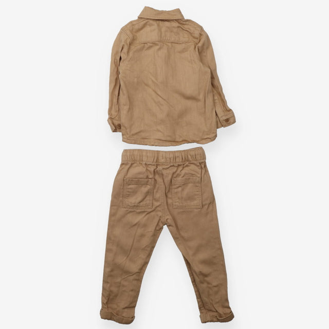 Brown denim outfit with digger applique