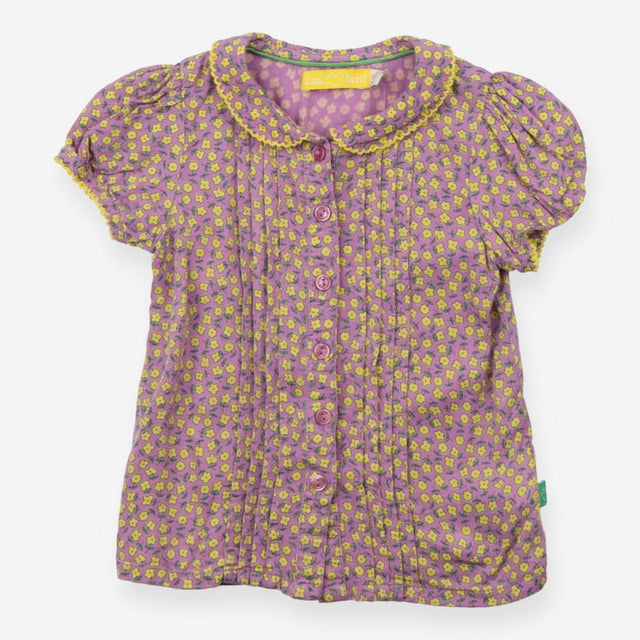 Purple blouse with yellow flowers