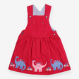 Pinafore pink dinos round hem striped lining