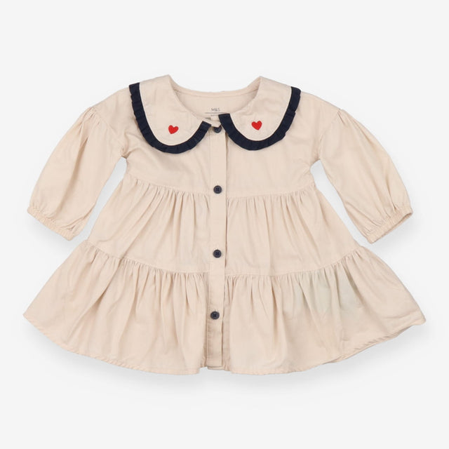 Beige collared dress with navy and heart applique