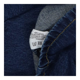 Denim shirt with oversize collar