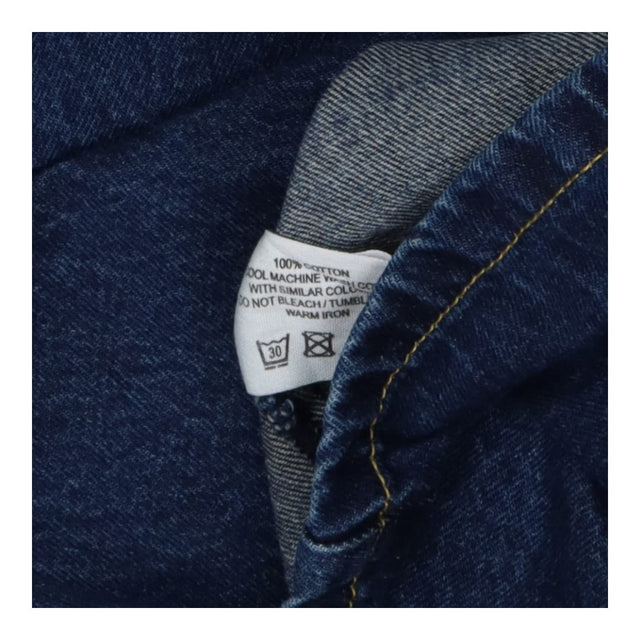 Denim shirt with oversize collar