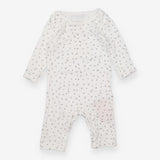 Footless sleepsuit white half moons and stars