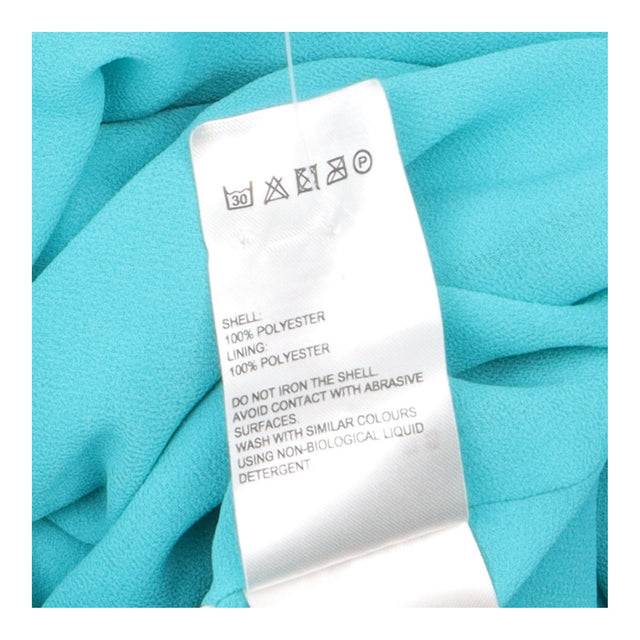 Turquoise Sleeveless V-Neck Fit and Flare Dress wi