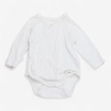 white wrap over bodysuit