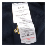 Navy crew neck sweater with embroidered yellow flo