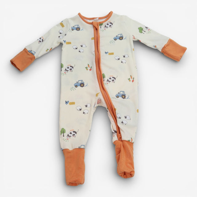 Sleepsuit cream orange edging farm