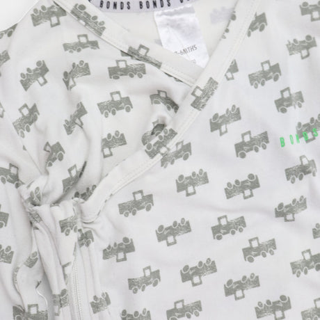 White sleepsuit grey tractors