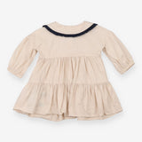Beige collared dress with navy and heart applique