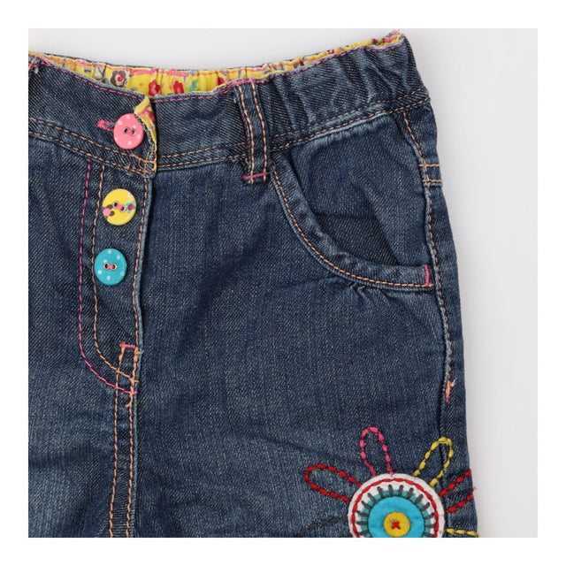 patchwork jeans with flowers and owl appliques