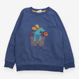 Blue sweater with dragon and castle