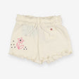 Cream jersey shorts with embroidered flower