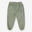 Green cord trousers