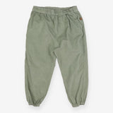 Green cord trousers