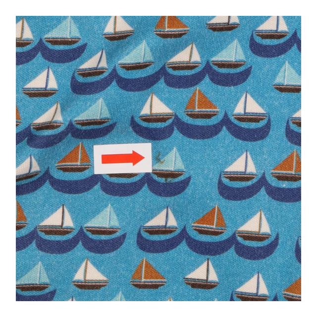 Onesie blue boats with orange lining 