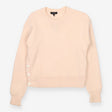 Pink knit crew neck sweater with side button deta