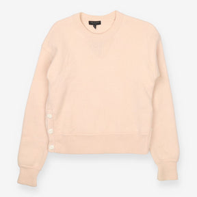 Pink knit crew neck sweater with side button deta