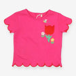Pink t-shirt with big red tulip