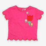 Pink t-shirt with big red tulip