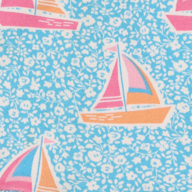 Dress blue with sailboats and white floral print