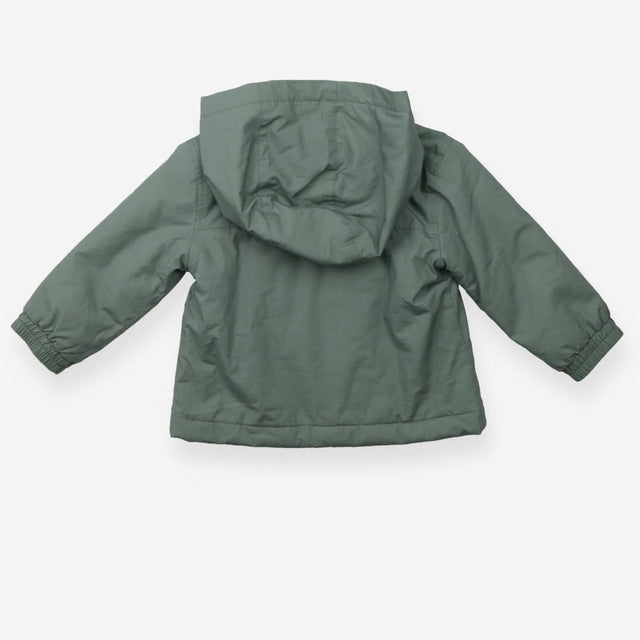 Khaki coat with lion pocket