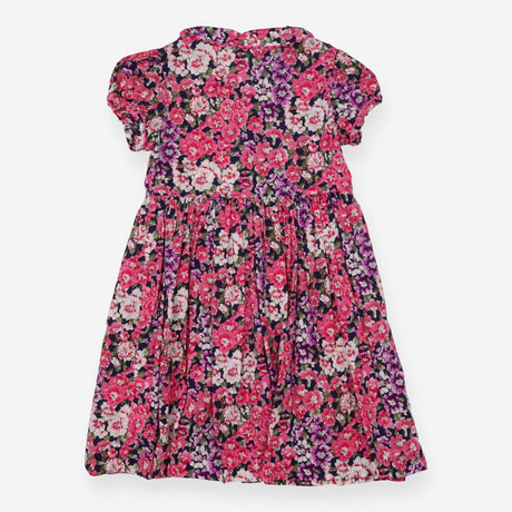 Navy dress with bold pink and purple flowers