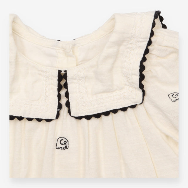 Dress long sleeved woven white with black embroide