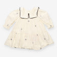 Dress long sleeved woven white with black embroide
