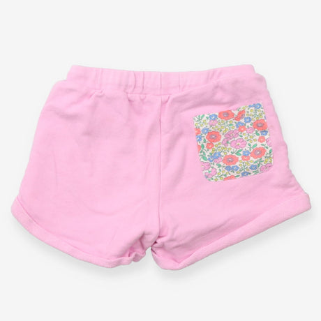 Pink jersey shorts with floral tie and pocket