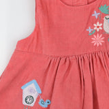 Pink cord dress with bunnies and birds