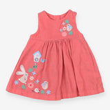 Pink cord dress with bunnies and birds