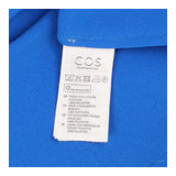 Cobalt blue long sleeve tie neck blouse