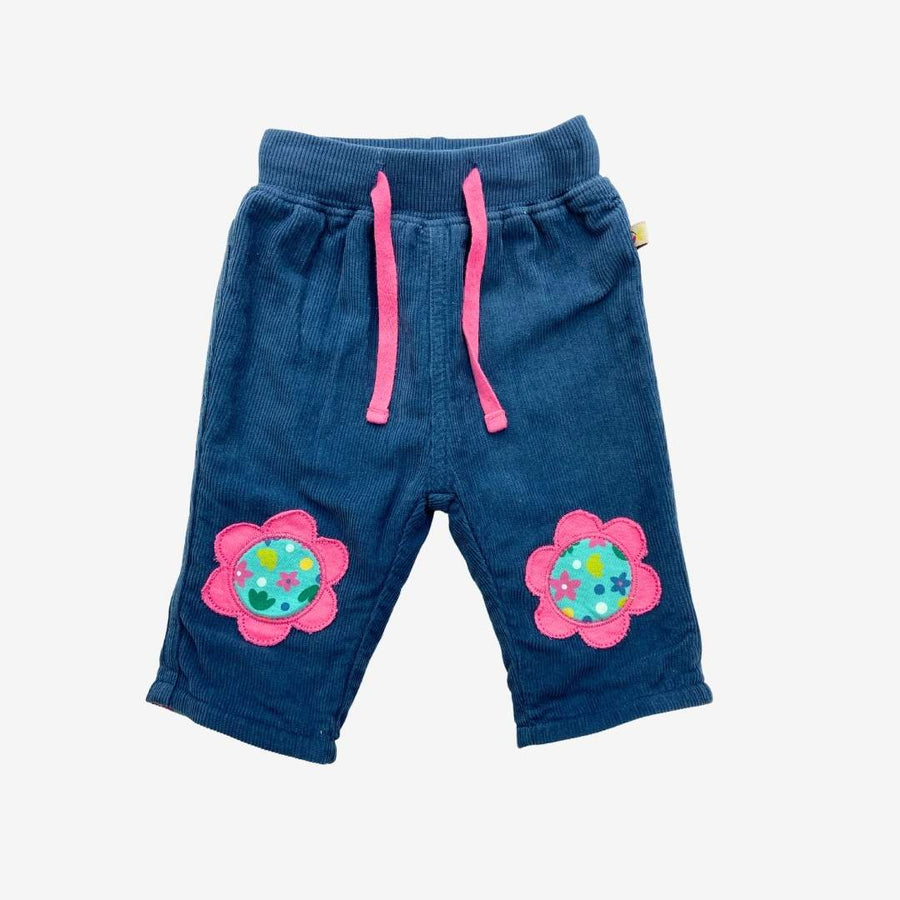 Reversible pull on cord trouser