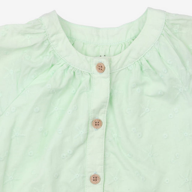 Green dress with embroidered detail