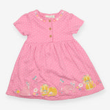 Pink spot jersey dress with lion cheetah applique