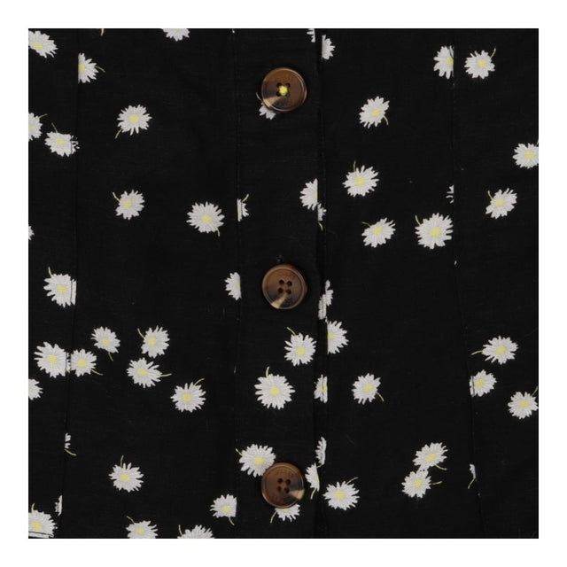 Skirt black with daisies