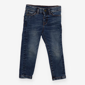 Jeans orange stitching worn leg effect