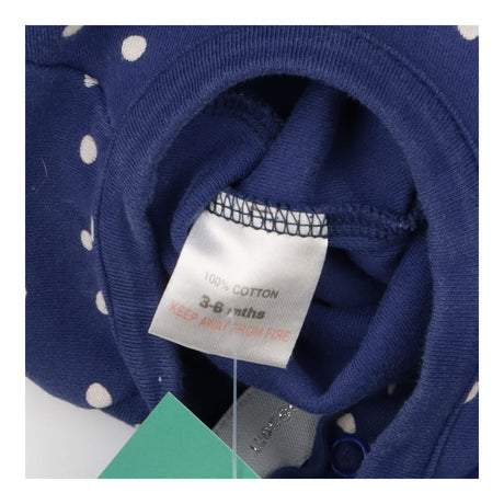 Navy polkadot footless sleepsuit