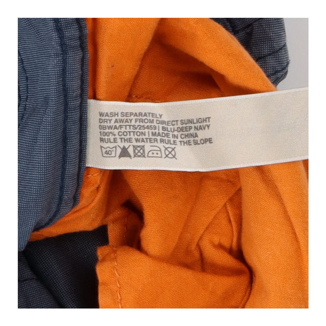Cuffed blue cotton cargo trousers