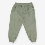 Green cord trousers