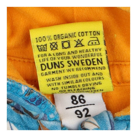 Onesie blue boats with orange lining 