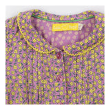 Purple blouse with yellow flowers