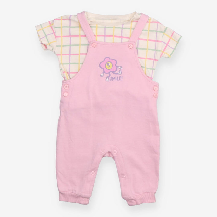 Dungarees pink with flower and checkered t-shirt